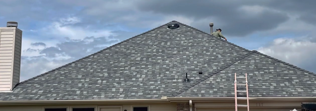 Allen Texas Roofing Placing Asphalt Shingles On A Roof In Allen Texas